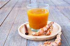 pembuatan minuman kunyit asem